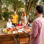 Família aproveitando churrasco de chef ao ar livre com menu variado e ambiente descontraído na natureza.